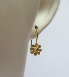 Flower Earrings - Beautiful 18K solid gold Earrings inlaid 3 Points diamonds. The Flower size - 6 mm. The Earrings are part of My Hidden Seeds Collection. The earring are handmade and one of a kind earrings. Free Shipping The earrings will be packed in a Beautiful gift box . Your earrings will be shipped via registered air mail with tracking number. Please contact me with any questions or requests. My Sterling Silver Hidden Seeds Collection at http://www.etsy.com/il-en/shop/NogaJewelry# Fine Jewelry Flower-shaped Earrings With Single Cut Diamonds, Fine Jewelry Flower-shaped Diamond Earrings, Flower Shaped Diamond Earrings In Fine Jewelry Style, Hand-set Yellow Gold Earrings Gift, Hand Set Yellow Gold Earrings For Gift, Yellow Gold Hand Set Earrings As Gift, Flower Shaped Earrings With Single Cut Diamonds, Yellow Gold Earrings With Single Cut Diamonds For Gift, Yellow Gold Earrings With Single Cut Diamonds