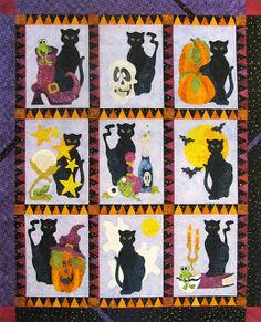 a quilted wall hanging with black cats and pumpkins on it's sides