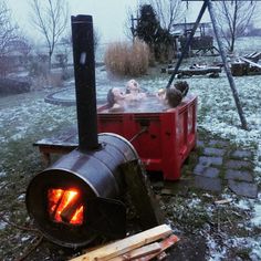 an outdoor hot tub in the middle of winter