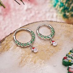 This Santa Claus is the most adorable dangle ever! Whether you're attending holiday gatherings or parties, or just want to spread a little cheer, this Santa Christmas septum ring is the perfect accessory for the season.