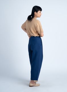 KAAREM - Waxy Pleated Tapered Cropped Pant (Unisex) - Salt Blue Modern Blue Pants With Belt Loops, High-waisted Tapered Linen Pants, Tapered High-waisted Linen Pants, Linen High-waisted Bottoms With Side Pockets, Modern Linen Tapered Leg Bottoms, Linen Ankle Pants With Belt Loops, Ankle-length Linen Pants With Belt Loops, Modern Linen Tapered Leg Pants, Modern Tapered Leg Linen Pants