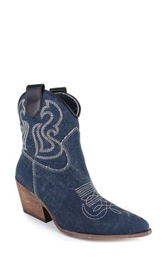 Decorative stitching and side pull-tabs lend Western-inspired elements to a trend-savvy bootie balanced by a pointy toe and block heel. 2 1/2" heel 5 1/2" shaft Leather or textile upper/leather lining and sole Made in Italy Western Denim Blue Boots For Fall, Denim Blue Western Boots For Fall, Western Style Denim Blue Boots For Fall, Denim Blue Pointed Toe Denim Boots, Dark Wash Denim Boots With Round Toe, Western Denim Boots With Round Toe, Western Denim Boots, Denim Round Toe Boots For Fall, Denim Boots With Round Toe For Fall