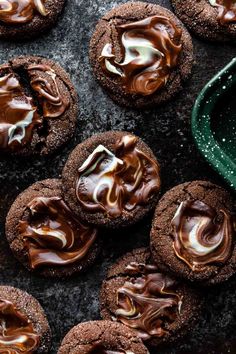 chocolate cookies with melted chocolate on top