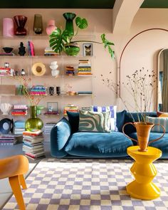 a living room filled with furniture and decor