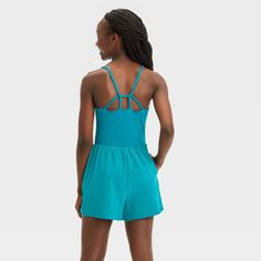 Why we're ALL IN: Sleeveless romper made with moisture-wicking, quick-drying fabric with spandex. The at-knee length romper comes with a built-in brief, a stash pocket, and has a pull-on style. Plus, the UPF 50+ rating helps keep skin shielded from UV rays. All in Motion™: Inspiring the potential in every body. Summer Sports Tank Top With Built-in Shorts, Solid Color Jumpsuits And Rompers For Summer Playwear, Green Sleeveless Jumpsuits And Rompers For Yoga, Solid Color Summer Activewear With Moisture-wicking, Green Sleeveless Jumpsuits And Rompers For Gym, Summer Sports Activewear With Adjustable Straps, Summer Activewear With Adjustable Straps For Sports, Sleeveless Athleisure Swimwear With 4-way Stretch, Summer Gym Activewear With Adjustable Straps