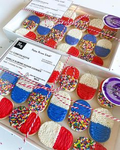 decorated cookies in the colors of the american flag are on display for people to see