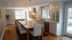 the kitchen is clean and ready to be used as a dining room or family room