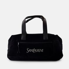 • Fixed handles and adjustable and removable shoulder strap
 • Zip closure
 • Embroidered logo
 • Interior and exterior zipped pockets
 • Solid color
 • Made of cotton
 • Leather details Black Travel Bag, Saint Laurent Logo, Logo Travel, Mens Travel Bag, Travel Logo, Black Travel, Bags Logo, The Saint, Black Exterior