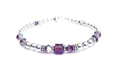 STERLING SILVER PURPLE AMETHYST FEBRUARY BIRTHSTONE BRACELETS The elegance and durability of genuine silver, the dazzle of genuine Swarovski! You’ll love this simple, classic February birthstone bracelet - stackable, well made, and trendy! Sterling Silver Birthstone Bracelets showcases Swarovski Crystals in sparkling simulated Purple Amethyst which is the traditional birthstone for the month of February This Swarovski Crystal Birthstone Beaded Bracelet is 100% Handmade in the USA and made to giv Birthday Gifts Mom, Birthstone Crystals, Sapphire Birthstone, Sterling Silver Bead Bracelet, Birthstone Bracelet, Crystal Healing Bracelets, Silver Bead Bracelet, Crystal Beads Bracelet, Bohemian Bracelets