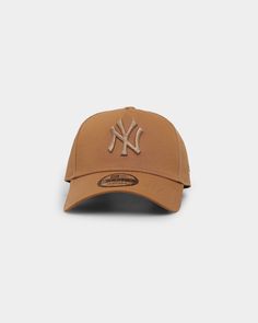 New Era New York Yankees Tonal 9FORTY A-Frame Snapback Wheat | Culture Kings US Yankees World Series, Atlanta Braves World Series, World Baseball Classic, Embroidery Detailing, New Era 9forty, Green Bottom, New Era 59fifty, Philadelphia Phillies, Culture Kings