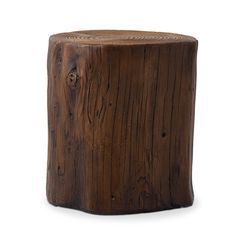 a wooden stool made out of wood with knots on the top and bottom, sitting in front of a white background