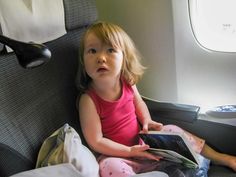 A comprehensive guide for flying with kids and babies including what to pack, how to keep them entertained, best gear, long-haul flights, and much more. Travel Outfit Plane Long Flights, Packing Videos, Small Tv, Winter Tips, Travel Outfit Plane