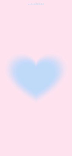 a blue heart on a pink background