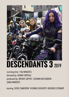 the poster for descendants 3 is displayed in front of a group of people