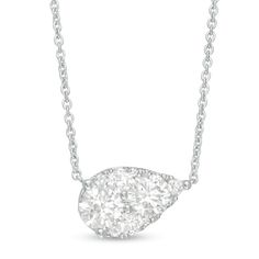 A clever choice with plenty of sparkle, this diamond necklace fits any occasion with ease. Fashioned in 14K white gold, this contemporary look features a sideways pear-shaped diamond composite boasting a pair of 1/2 ct. diamonds. Radiant with 1-1/4 cts. t.w. of diamonds and a brilliant buffed luster, this design suspends centered along an 18.0-inch cable chain that secures with a lobster claw clasp. Pear-shaped Diamond Necklace With Accents, White Pear-shaped Diamond Necklace With Accents, Pear-shaped White Diamond Necklace, White Pear-shaped Diamond Cut Necklace, Pear-shaped White Diamond Cut Necklace, White Pear-shaped Diamond Necklace, Fine Jewelry White Pear Diamond Necklace, White Diamond Necklace With Pear Accents, White Diamond Necklace With Pear Shaped Diamond Accents