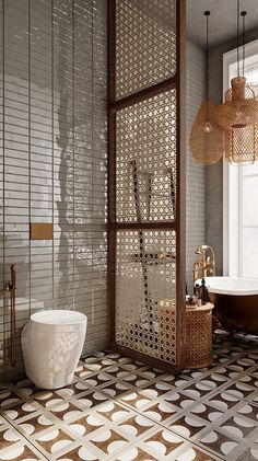 a bath room with a toilet and a bath tub next to a window in it