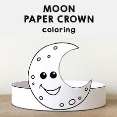 the moon paper crown is sitting on top of a table