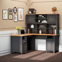 a corner desk with an open bookcase on top