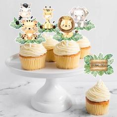 cupcake toppers with jungle animals on them