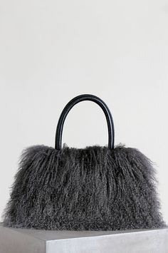 click to expand Rectangular Sheepskin Bags, Winter Evening Bag With Top Handle, Fluffy Shoulder Bag For Daily Use, Luxury Faux Fur Shoulder Bag For Everyday Use, Chic Fluffy Shoulder Bag For Everyday, Daily Use Fluffy Shoulder Bag, Fluffy Tote Shoulder Bag, Luxury Sheepskin Bag For Everyday Use, Fluffy Rectangular Shoulder Bag For Everyday Use