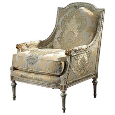 an ornately decorated chair is shown against a white background with gold and silver accents