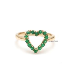 Real emerald heart ring gold | Natural emerald cut heart ring gold | Emerald birthstone ring gold | Heart shape emerald | Emerald ring gold STONE DETAILS : ✦ Gemstone : Emerald ✦ Gemstone Type : Natural ✦ Gemstone Size : 2.00 MM ✦ Gemstone Shape : Round ✦ Number of gemstones : 14 ✦ Gemstone Weight : 0.30 carats ✦ Gemstone Grade : AAA METAL DETAILS : ✦ Metal : 14K/18K Gold ✦ Metal Color : Yellow / White / Rose Gold ✦ Setting : Prong Setting ✦ Ring Box : Yes SHIPPING DETAILS : ✦ Shipped via : USPS Green Heart Ring For May Birthstone, Fine Jewelry Style, Fine Jewelry Green Heart Ring For May Birthstone, Green Heart Ring For May Birthstone, Emerald Heart-shaped Anniversary Rings, Heart-shaped Emerald Rings For Wedding, Fine Jewelry Green Heart Shaped Ring, Green Heart-shaped Ring For May Birthstone, Emerald Heart Shaped Anniversary Rings, Green Heart-shaped Fine Jewelry Ring