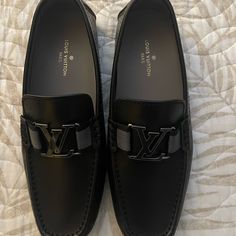 Lv Monte Carlo Loafer 100% Authentic Never Worn Lv Loafers Men, Luxury Black Slip-on Moccasins, Luxury Black Moccasins For Work, Luxury Black Moccasins, Luxury Black Slip-ons With Round Toe, Luxury Formal Slip-ons With Flat Heel, Luxury Slip-on Black Leather Shoes, Luxury Black Slip-on Leather Shoes, Designer Black Slip-on Shoes