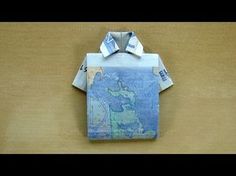 an origami shirt made out of paper