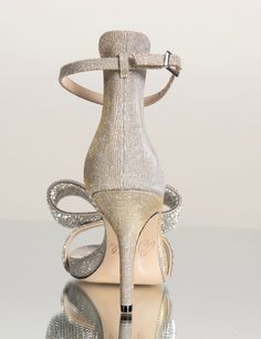 Open Toe Sandal 3 inch heel Crystal Bow Detail Lurex Silver/Gold Leather Lining Leather Sole Thin Ankle Strap with buckle closure Fit runs true to U.S size whole sizes only 6-11 3 Inch Heels, Open Toe Sandals, Gold Leather, Bow Detail, Open Toe, Ankle Strap, Silver Gold, Sandals Heels, Buckle