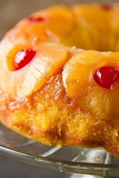 a pineapple upside down cake on a glass plate