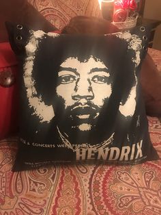 a pillow with the image of a man's face on it