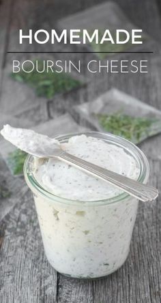 homemade bourssin cheese in a jar with a spoon