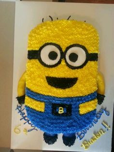 a birthday cake made to look like a minion