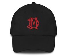 "Every two-letter combination is available, making this embroidered hat a truly custom piece. Details: - 100% chino cotton twill - Adjustable back strap with antique buckle - Fits a Head circumference of 20 ½\" - 21 ⅝\" WHEN ORDERING: 1. Please select the color of your hat (primary) and monogram (secondary) from the drop down menus. 2. List the two letters you would like combined. PLEASE NOTE: If you would like a proof of your monogram before it is printed, please leave request in the comments. Cotton Baseball Cap With Logo And Flat Brim, Classic Cotton Fitted Hat With Embroidered Logo, Logo Cotton Baseball Cap With Flat Brim, One Size Fits Most Letter Embroidery Baseball Cap, Cotton Dad Hat With Letter Embroidery And Flat Bill, Casual Sports Hat With Letter Embroidery, Flat Brim Cotton Hat With Logo, Embroidered Cotton Dad Hat With Flat Brim, Flat Brim Cotton Baseball Cap With Logo