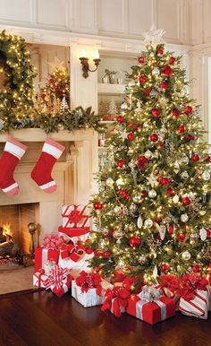 a decorated christmas tree with presents under it