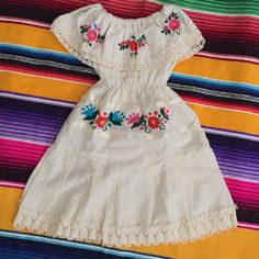 Cute Mexican Baby Dress Hand Embroidered Style ; Off The Shoulders Size ; 24 Months Baby ( 2 Years Old ) Hem Length To Below Knees Or Calf , Depende Your Baby Height Measurements; Length; 18” Shoulder And Waist Elastic Bands Are Stretchy New - No Tags - Hand Made Cute Embroidered White Dresses, Cute White Embroidered Dresses, Cute White Dress With Embroidered Hem, Mexican Baby Dress, Baby Mexican Dress, Puebla Dress, Baby Birthday Outfit, Mexican Babies, Pots Diy