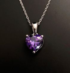 Solid Sterling Silver Amethyst February birthstone heart pendant. Great February birthday gift, valentines gift or 6th wedding Anniversary gift. Matching earrings available here: https://www.etsy.com/listing/1352794165/ Available to order in gold, white gold, rose gold or platinum, please contact me for prices. 💎Pendant thickness: 6mm 💎Pendant width: 9mm 💎Pendant overall Length: 17mm 💎Chain length: 18 inch or other length if required. ✨ For free giveaways, special offers and latest design up Purple Sterling Silver Necklaces For Valentine's Day, Heart-shaped Gemstone Necklace For Wedding, Heart-shaped Gemstone Heart Necklace For Weddings, Purple Sterling Silver Heart Cut Necklace, Gemstone Heart Pendant Necklace For Wedding, Heart Shaped Gemstone Necklace For Wedding, Purple Heart Necklace With Heart Charm As A Gift, Wedding Heart Necklace With Gemstone In Heart Cut, Wedding Heart Necklace With Gemstone