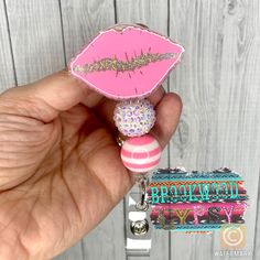 2 inch acrylic backed in glitter topped with vinyl & sealed for durability and longevity. Attached to a retractable alligator swivel clip or belt clip. *colors will vary depending on which device you are viewing the item & depending on monitors settings or display views* Novelty Pink Personalized Badge Reel, Novelty Personalized Pink Badge Reel, Personalized Pink Novelty Badge Reel, Pink Personalized Novelty Badge Reel, Fun Pink Badge Reel For Gift, Personalized Fun Pink Badge Reel, Pink Handmade Craft Supplies For Party Favors, Handmade Pink Craft Supplies For Party Favors, Cute Pink Badge Reel For Birthday