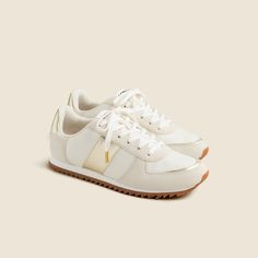 J.Crew trainers in metallic colorblock Sporty Metallic Sneakers With Translucent Outsole, Metallic Low-top Sneakers With Perforated Toe Box, Sporty Metallic Lace-up Sneakers, Metallic Lace-up Sporty Sneakers, Metallic Sporty Sneakers For Jogging, Gold Low-top Sporty Platform Sneakers, Sporty Metallic Sneakers For Jogging, Sporty Metallic Sneakers, Casual Metallic Sneakers