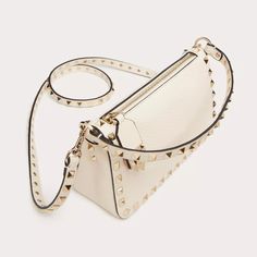 Small Valentino Garavani Rockstud crossbody pouch bag in grainy calfskin leather. The iconic hook closure is reinterpreted to secure the zip pull. Valentino Garavani Bag, Studded Bag, Vintage Leather Bag, Valentino Rockstud, Black Leather Handbags, Valentino Bags, Linen Bag, Small Crossbody, Pouch Bag