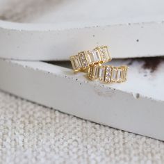 Cubic zirconia huggie earrings, small huggie hoops with diamond, Gold pave hoop, CZ hoop earrings, Gold huggie hoop earrings, Dainty hoops  Welcome to our store! We're so thrilled to have you here!  This minimalist small cubic zirconia gold hoop is perfect for daily wear, made with a thick plating of 18k Gold to ensure that your earrings stay shiny and are hypoallergenic.  ♥  J E W E L R Y ∙ D E T A I L  - Material: high quality 18k gold plated - Size: exterior diameter is 14mm - Post (needle): Diamond Huggie Earrings With Sparkling Stones For Gift, Diamond White Cubic Zirconia Huggie Earrings, Huggie Earrings With Baguette Diamonds For Gift, Huggie Cartilage Earrings With Diamond Accents, Gift Huggie Earrings With Baguette Diamonds, Cubic Zirconia Huggie Cartilage Earrings With Diamond Accents, Gold Cubic Zirconia Huggie Ring, Cubic Zirconia Huggie Rings As Gift, Cubic Zirconia Rings Suitable As Gifts