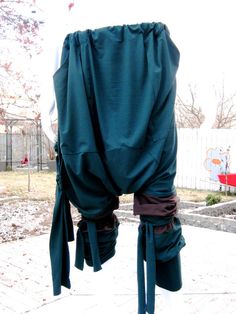 These mega harem pants are super comfortable, stretchy, lightweight, and made from cotton and spandex. Ties on the side with a fisherman pant style Green Baggy Harem Pants In Hippie Style, Baggy Green Hippie Harem Pants, Green Harem Pants For Festival, Green Bohemian Harem Pants With Loosely Fitted Hips, Green Baggy Harem Pants, Bohemian Green Harem Pants With Loose Fit, Traditional Green Harem Pants With Loosely Fitted Hips, Green Bohemian Harem Pants, Baggy Green Pants For Festival