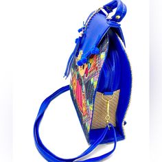 This Beautiful Stylish Bag Can Be Use As Cross Body And Handbag The Vibrant Colors Will Make Any Outfit Look Fresh And Stylish Made By Chiapanecas Artisians From Zinacatn Luxury Satchel Purse With Strap 34” Long Adjustable To 17” Minimum 9” Length 10” 1/2 High 4” Wide Blue Shoulder Bag With Cell Phone Pocket For On-the-go, Blue Shoulder Bag For Mobile Phone On-the-go, Casual Blue Satchel With Zipper Closure, Blue Summer Bags With Zipper Closure, Summer Blue Bags With Zipper Closure, Blue Casual Pouch Satchel, Blue Mobile Phone Pouch Shoulder Bag, Casual Blue Pouch Satchel, Blue Rectangular Bag With Zipper Pocket