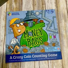 a game called money bags on a wooden table