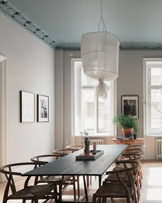 the dining room is clean and ready for us to eat dinner on it's long table