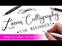 a hand holding a pen and writing on paper with the words learn calligraphy for beginners