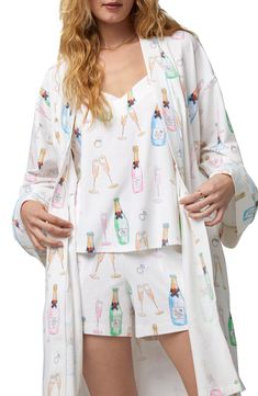 Start your new life together with plenty of sparkling toasts and time in this playful organic-cotton jersey robe finished with neat piping. 38" length Shawl collar Long sleeves Removable tie belt 93% organic cotton, 7% elastane Machine wash, tumble dry Imported Multicolor Spring Nightgown For Pajama Party, Long Sleeve Floral Print Nightgown For Sleepovers, Floral Print Long Sleeve Nightgown For Sleepovers, Spring Sleepwear With Built-in Bra For Pajama Party, V-neck Floral Print Nightgown For Pajama Party, Bed Head, Shawl Collar, Just Married, New Life