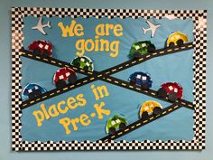 a bulletin board that says we are going places in pre - k with cars on the road