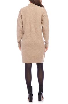 When dress days fall during sweater season, this cozy wool-kissed sweater-dress with an easy shift silhouette is the look you'll wear on repeat. 35 1/2" length (size Medium) Slips on over head Mock neck Dropped shoulders Long sleeves Ribbed cuffs and hem 35% recycled polyester, 27% acrylic, 15% nylon, 10% polyester, 8% wool, 5% spandex Dry clean Imported Cashmere Sweater Dress For Work In Fall, Casual Wool Sweater Dress For Winter, Casual Wool Sweater Dress, Casual Long Sleeve Wool Sweater Dress, Winter Cashmere Sweater Dress For Work, Fall Crew Neck Sweater Dress For Layering, Cozy Long Sleeve Wool Sweater Dress, Crew Neck Sweater Dress For Layering, Beige Sweater Dress For Daywear In Fall