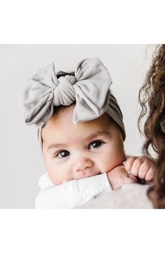 Stretchy nylon is the perfect blend of comfort and cute for this pair of bow-topped headbands. Includes two assorted headbands 3 1/2" bow width 80% nylon, 20% spandex Hand wash, dry flat Made in the USA Kids' Wear Bling Bows, Baby Bling, Best Bow, Grey Roses, Local Community, The Zoo, Nylon Headbands, Big Bows, Bow Hair Clips